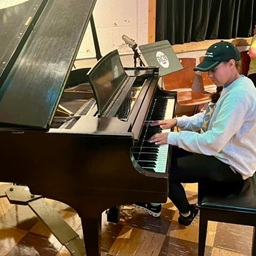 Maddy playing piano at Country Music Hall of Fame